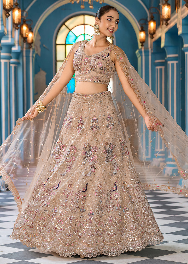 Buy Now Attractive Beige Net Embroidered Wedding Lehenga Choli Online in US, UK, Canada, France, Germany, Sweden, Greece, UAE, Denmark & Worldwide at Empress.