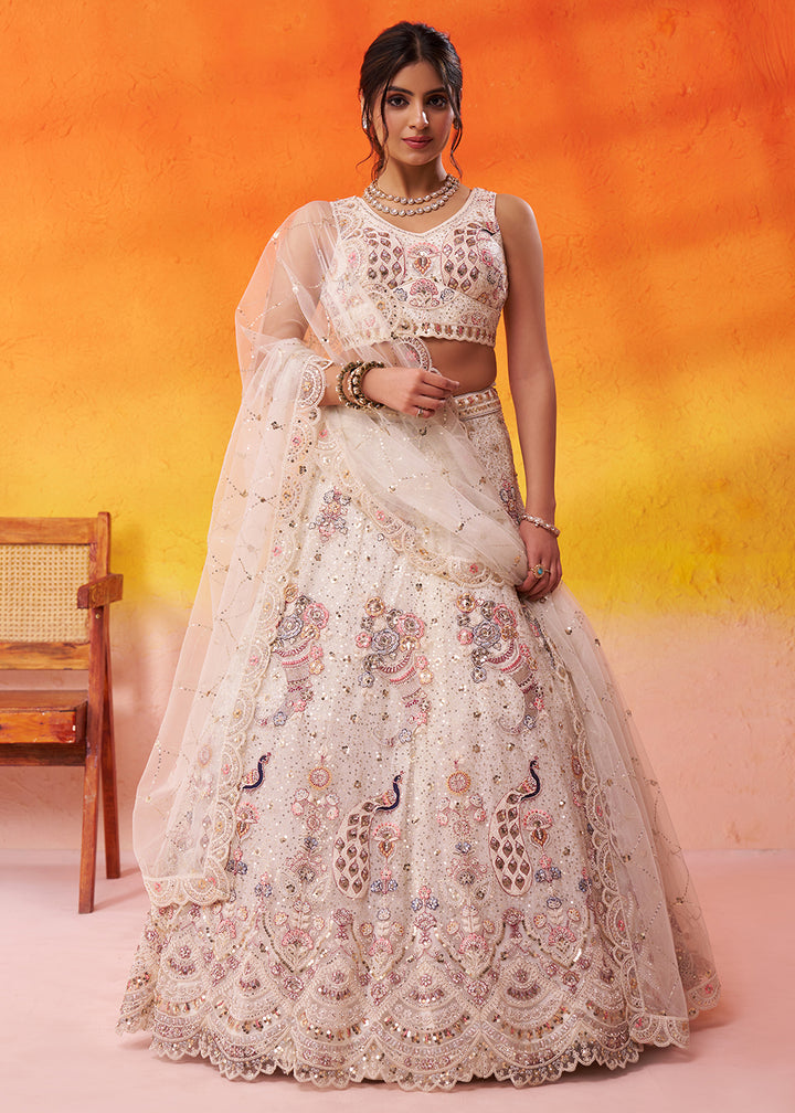 Buy Now Attractive Cream Net Embroidered Wedding Lehenga Choli Online in US, UK, Canada, France, Germany, Sweden, Greece, UAE, Denmark & Worldwide at Empress.