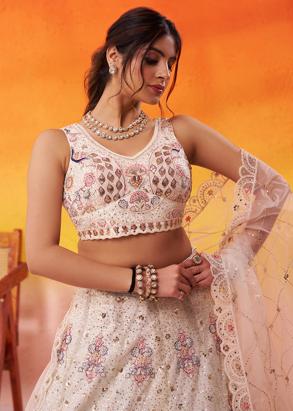 Buy Now Attractive Cream Net Embroidered Wedding Lehenga Choli Online in US, UK, Canada, France, Germany, Sweden, Greece, UAE, Denmark & Worldwide at Empress.