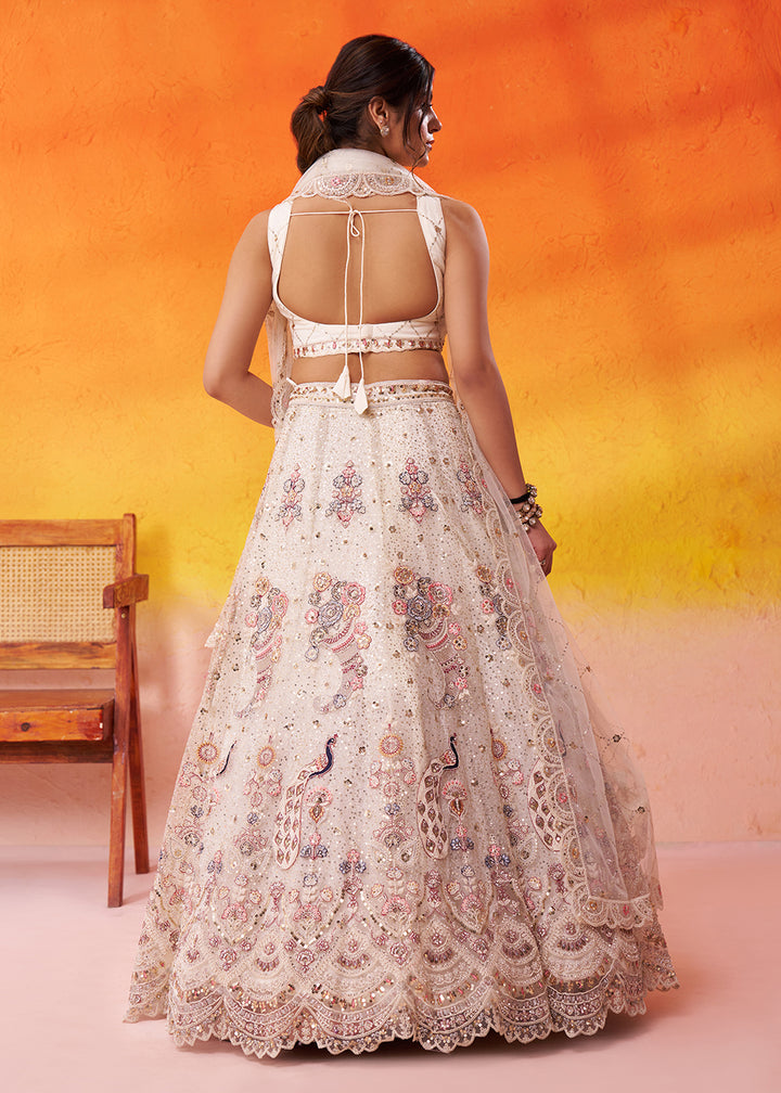 Buy Now Attractive Cream Net Embroidered Wedding Lehenga Choli Online in US, UK, Canada, France, Germany, Sweden, Greece, UAE, Denmark & Worldwide at Empress.