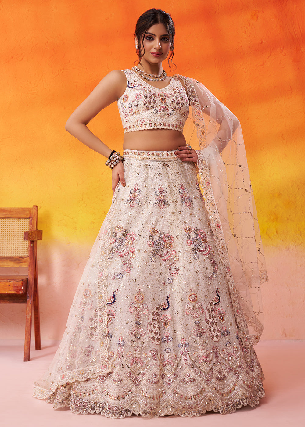 Buy Now Attractive Cream Net Embroidered Wedding Lehenga Choli Online in US, UK, Canada, France, Germany, Sweden, Greece, UAE, Denmark & Worldwide at Empress.