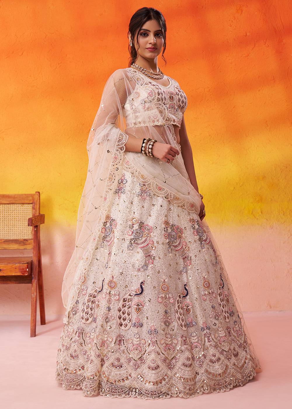 Buy Now Attractive Cream Net Embroidered Wedding Lehenga Choli Online in US, UK, Canada, France, Germany, Sweden, Greece, UAE, Denmark & Worldwide at Empress.