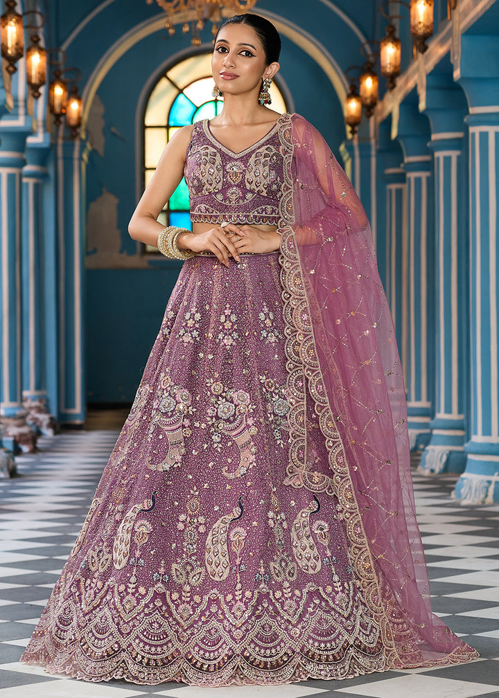Buy Now Attractive Lavender Net Embroidered Wedding Lehenga Choli Online in US, UK, Canada, France, Germany, Sweden, Greece, UAE, Denmark & Worldwide at Empress.