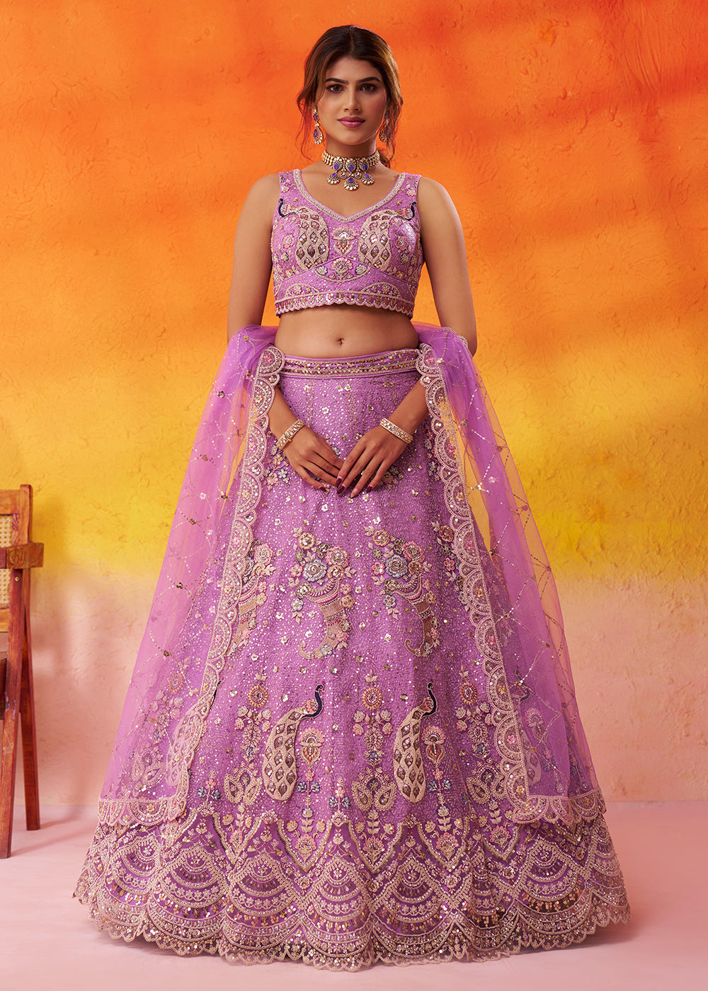 Buy Now Attractive Mauve Net Embroidered Wedding Lehenga Choli Online in US, UK, Canada, France, Germany, Sweden, Greece, UAE, Denmark & Worldwide at Empress.