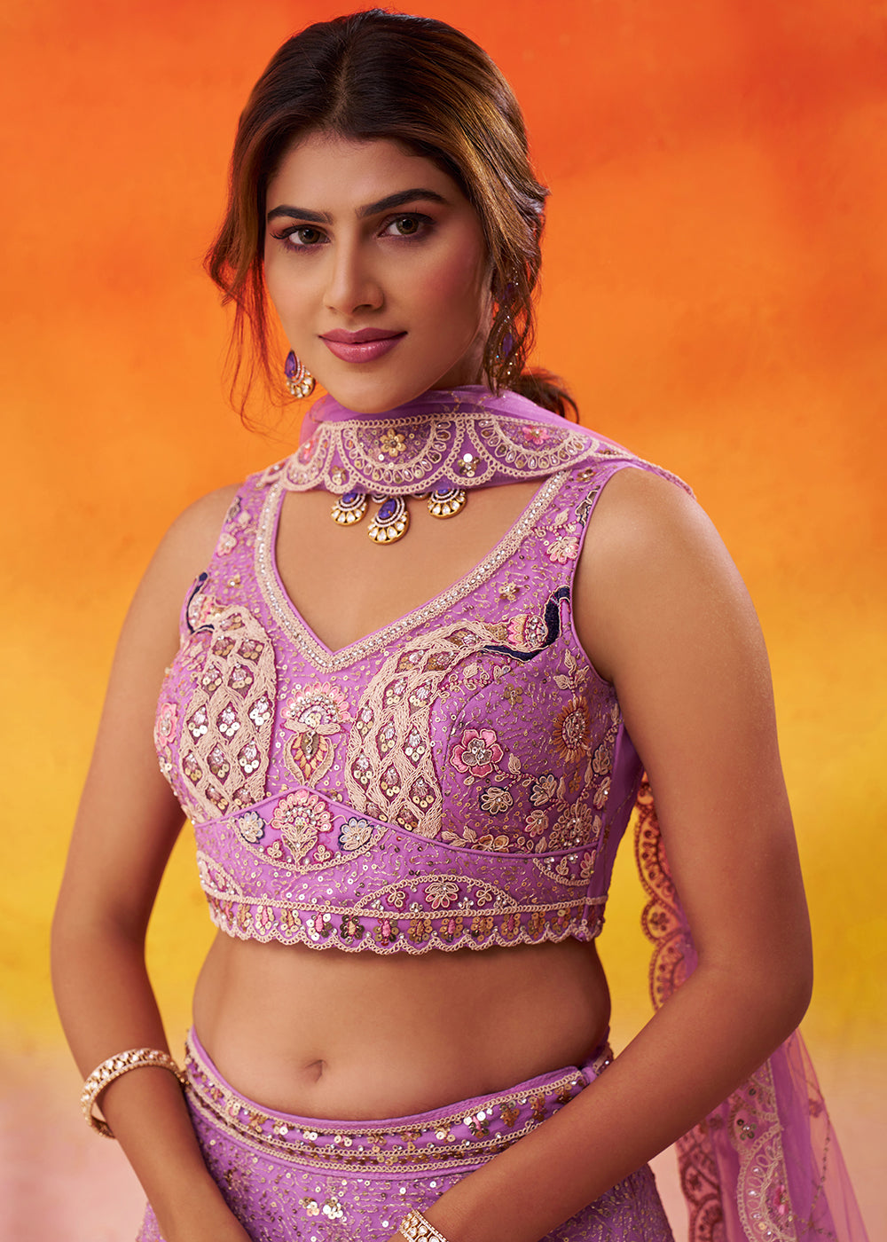 Buy Now Attractive Mauve Net Embroidered Wedding Lehenga Choli Online in US, UK, Canada, France, Germany, Sweden, Greece, UAE, Denmark & Worldwide at Empress.