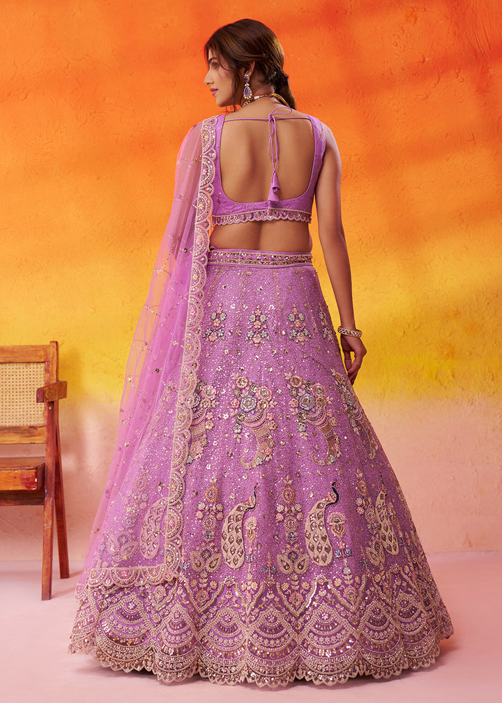 Buy Now Attractive Mauve Net Embroidered Wedding Lehenga Choli Online in US, UK, Canada, France, Germany, Sweden, Greece, UAE, Denmark & Worldwide at Empress.