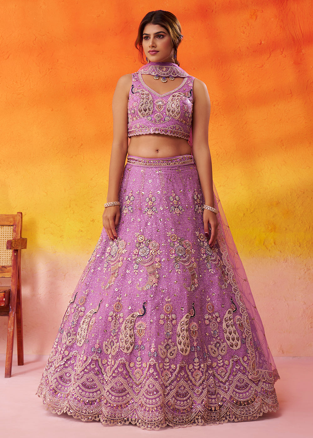 Buy Now Attractive Mauve Net Embroidered Wedding Lehenga Choli Online in US, UK, Canada, France, Germany, Sweden, Greece, UAE, Denmark & Worldwide at Empress.