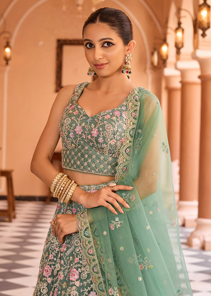 Buy Now Attractive Green Net Embroidered Wedding Lehenga Choli Online in US, UK, Canada, France, Germany, Sweden, Greece, UAE, Denmark & Worldwide at Empress.
