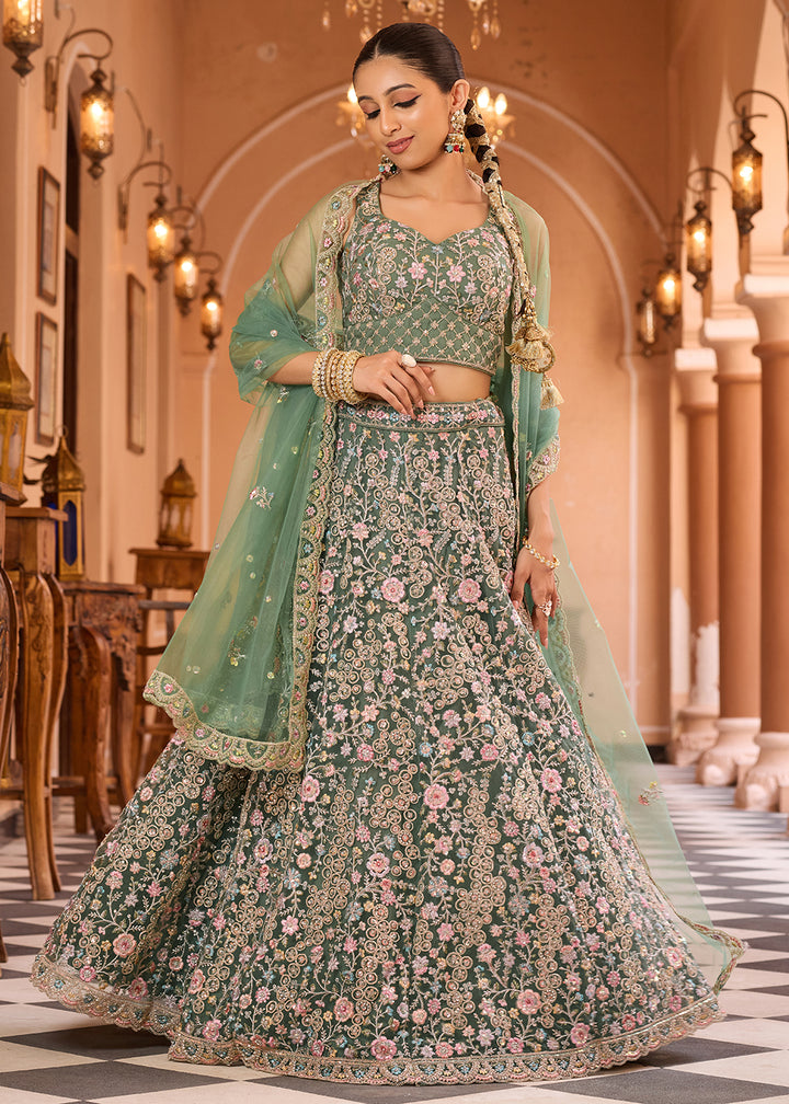 Buy Now Attractive Green Net Embroidered Wedding Lehenga Choli Online in US, UK, Canada, France, Germany, Sweden, Greece, UAE, Denmark & Worldwide at Empress.