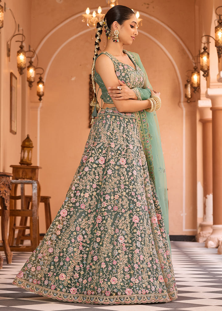Buy Now Attractive Green Net Embroidered Wedding Lehenga Choli Online in US, UK, Canada, France, Germany, Sweden, Greece, UAE, Denmark & Worldwide at Empress.