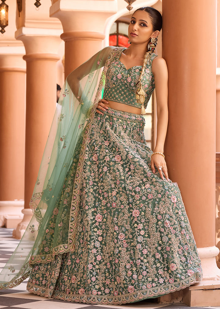 Buy Now Attractive Green Net Embroidered Wedding Lehenga Choli Online in US, UK, Canada, France, Germany, Sweden, Greece, UAE, Denmark & Worldwide at Empress.