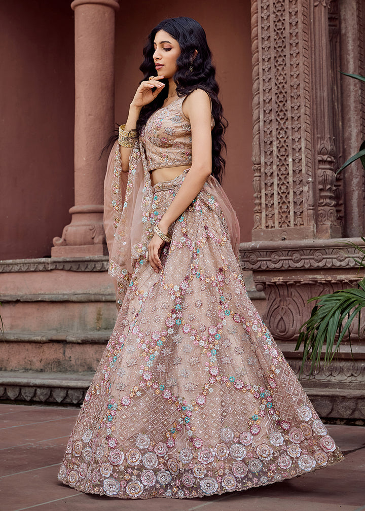 Buy Now Attractive Beige All Over Embroidered Wedding Lehenga Choli Online in US, UK, Canada, France, Germany, Sweden, Greece, Denmark & Worldwide at Empress.