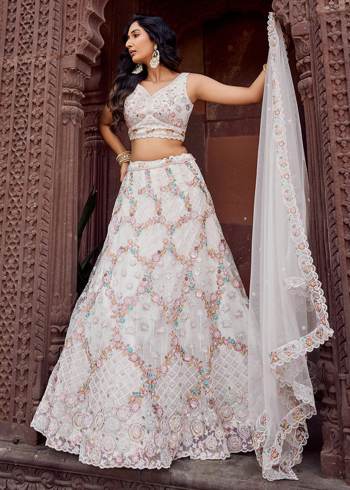 Buy Now Attractive Cream All Over Embroidered Wedding Lehenga Choli Online in US, UK, Canada, France, Germany, Sweden, Greece, Denmark & Worldwide at Empress.