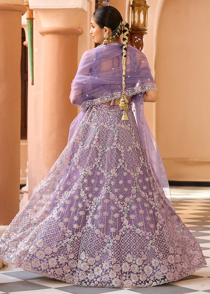 Buy Now Attractive Mauve All Over Embroidered Wedding Lehenga Choli Online in US, UK, Canada, France, Germany, Sweden, Greece, Denmark & Worldwide at Empress.