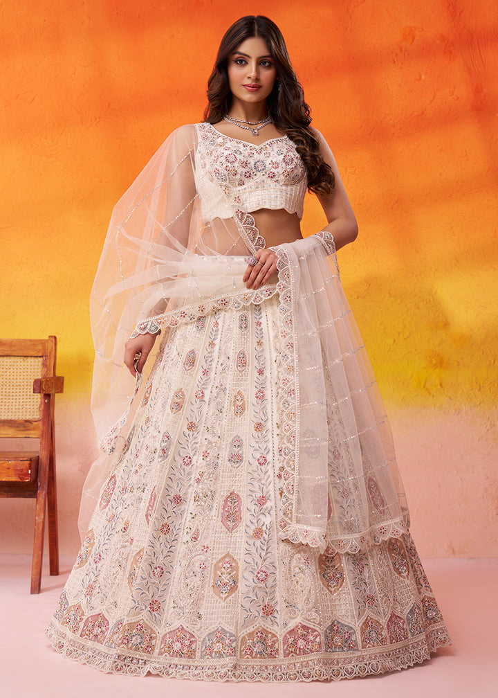 Buy Now Cream Flared Embroidered Festive Lehenga Choli Online in US, UK, Canada, France, Germany, Sweden, Greece, Denmark, UAE, Maldives & Worldwide at Empress.