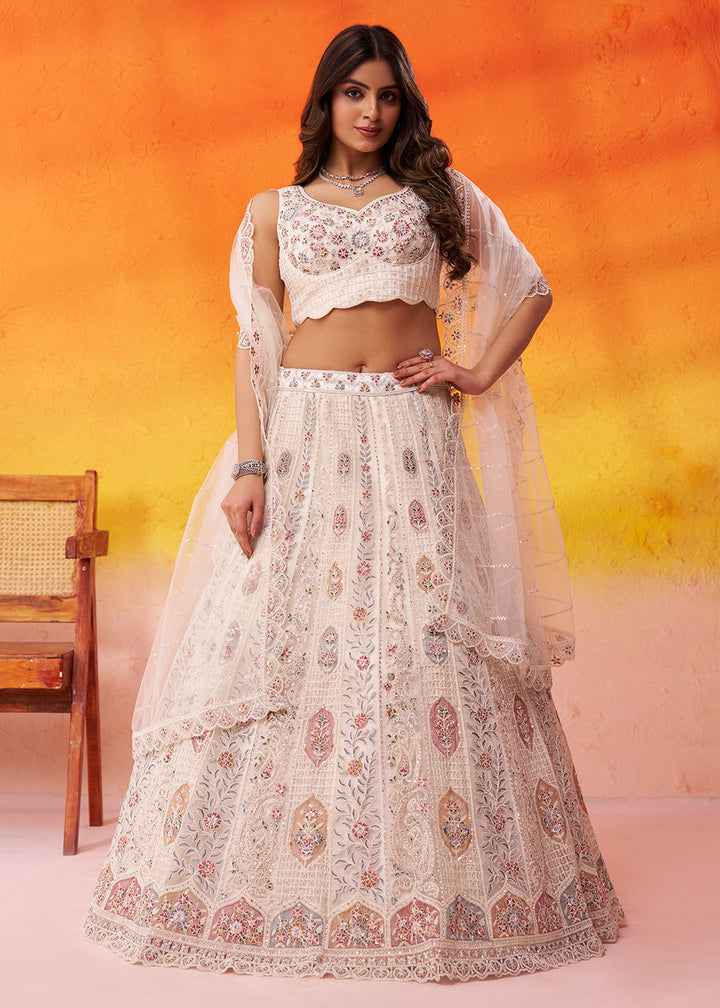 Buy Now Cream Flared Embroidered Festive Lehenga Choli Online in US, UK, Canada, France, Germany, Sweden, Greece, Denmark, UAE, Maldives & Worldwide at Empress.