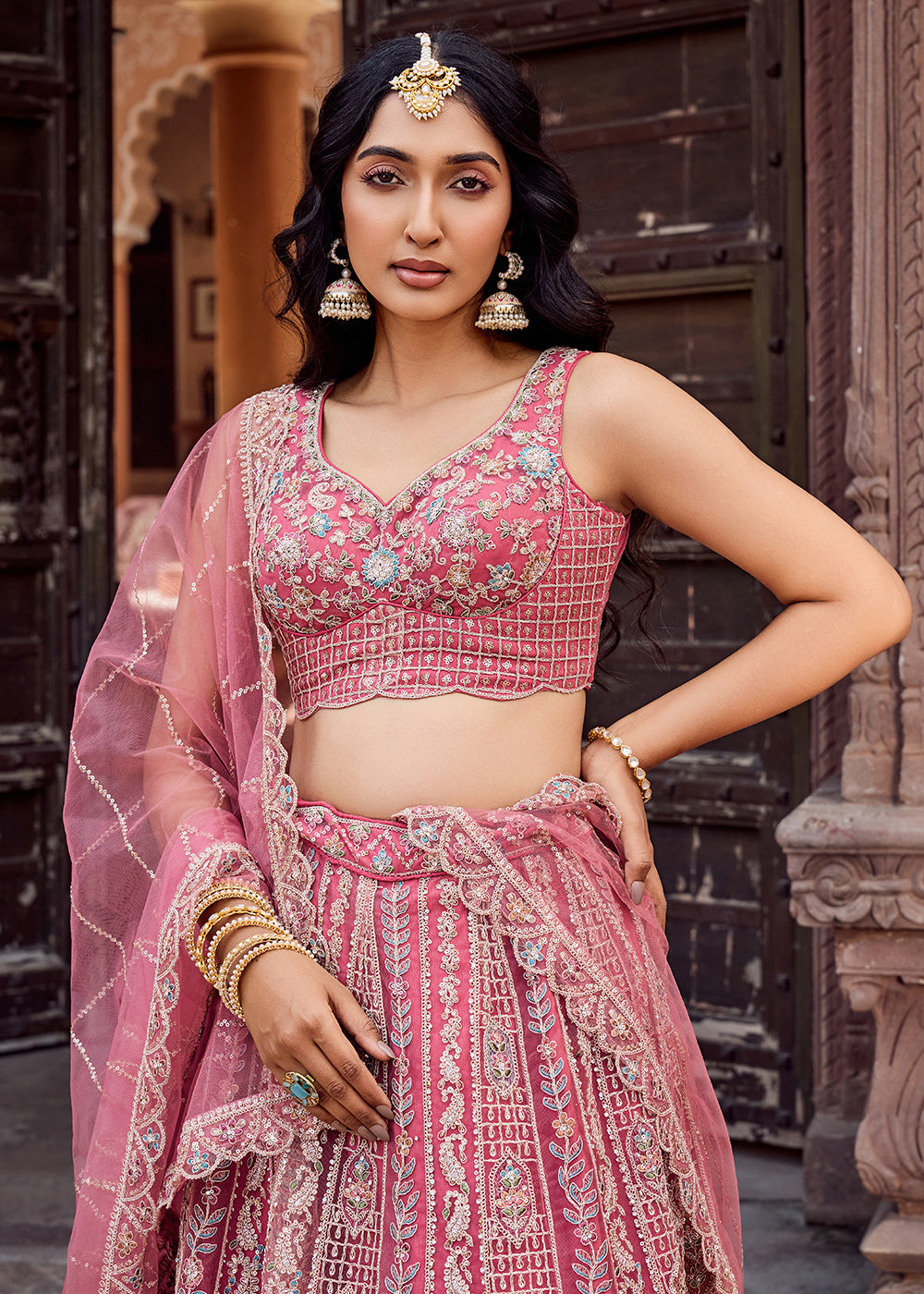 Buy Now Rose Gold Flared Embroidered Festive Lehenga Choli Online in US, UK, Canada, France, Germany, Sweden, Greece, Denmark, UAE & Worldwide at Empress.
