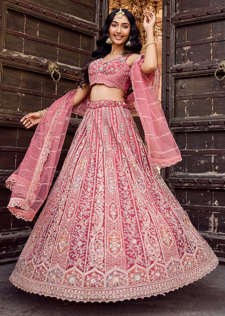 Buy Now Rose Gold Flared Embroidered Festive Lehenga Choli Online in US, UK, Canada, France, Germany, Sweden, Greece, Denmark, UAE & Worldwide at Empress.