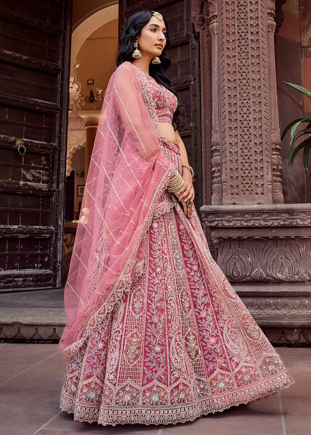 Buy Now Rose Gold Flared Embroidered Festive Lehenga Choli Online in US, UK, Canada, France, Germany, Sweden, Greece, Denmark, UAE & Worldwide at Empress.