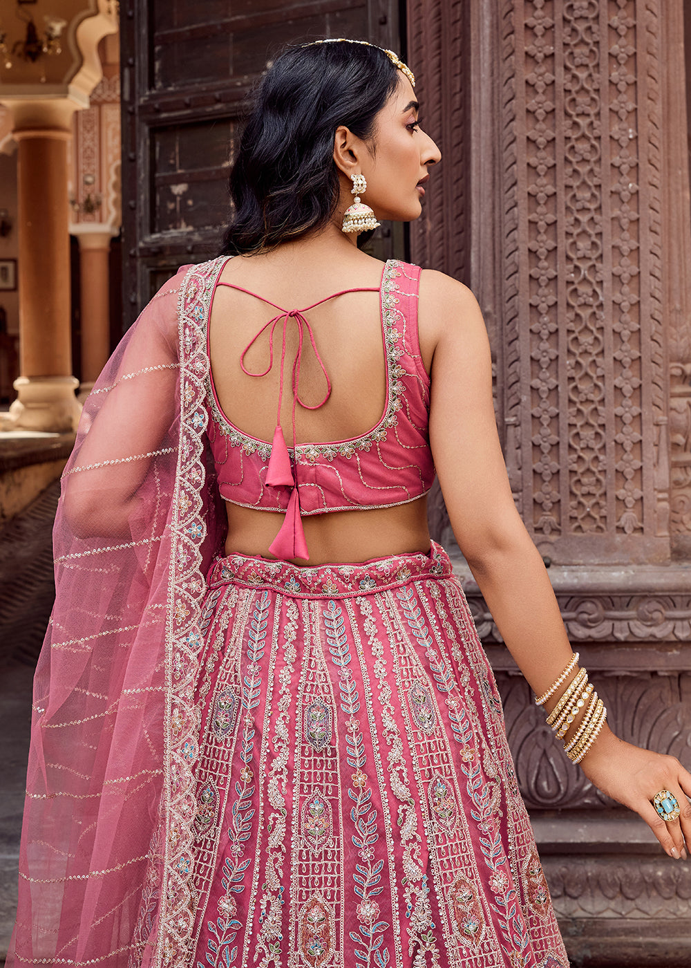 Buy Now Rose Gold Flared Embroidered Festive Lehenga Choli Online in US, UK, Canada, France, Germany, Sweden, Greece, Denmark, UAE & Worldwide at Empress.