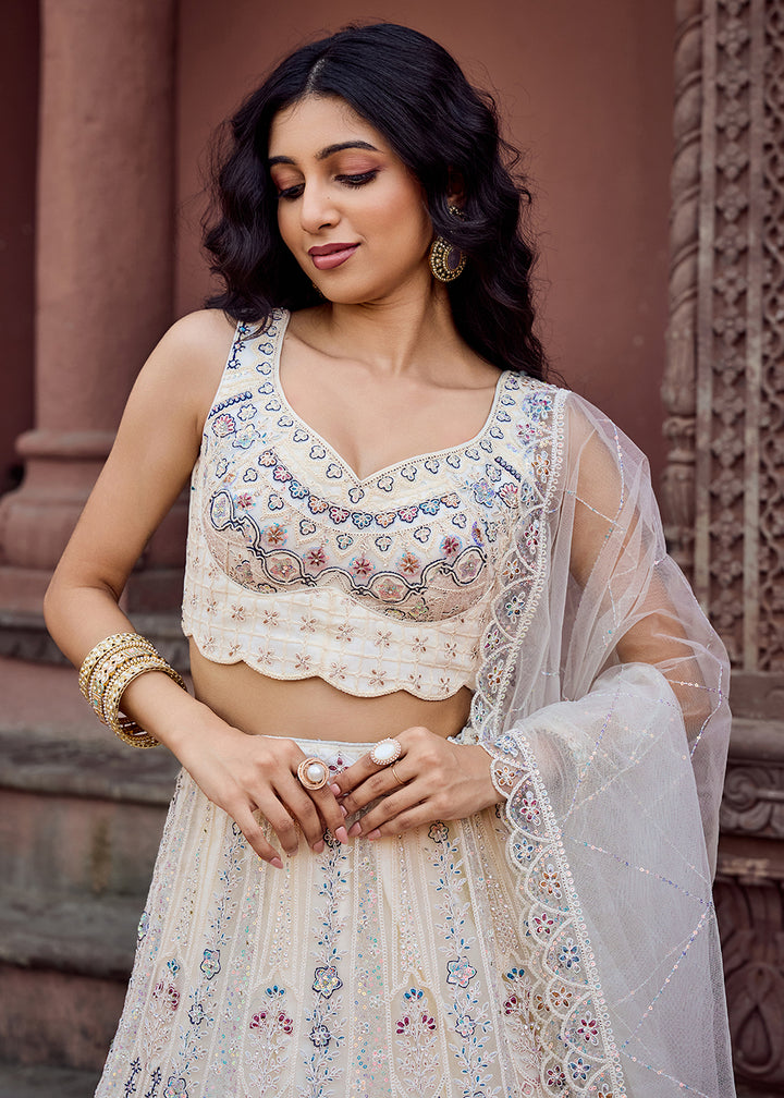 Buy Now Net Fabric Sequins Work Cream Wedding Lehenga Choli Online in US, UK, Canada, France, Germany, Sweden, Greece, Denmark, UAE & Worldwide at Empress.