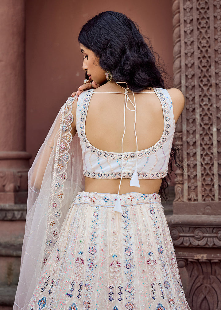 Buy Now Net Fabric Sequins Work Cream Wedding Lehenga Choli Online in US, UK, Canada, France, Germany, Sweden, Greece, Denmark, UAE & Worldwide at Empress.