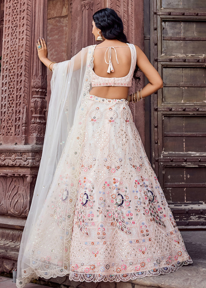 Buy Now Net Fabric Stone Work Cream Wedding Lehenga Choli Online in US, UK, Canada, France, Germany, Sweden, Greece, Denmark, UAE & Worldwide at Empress.
