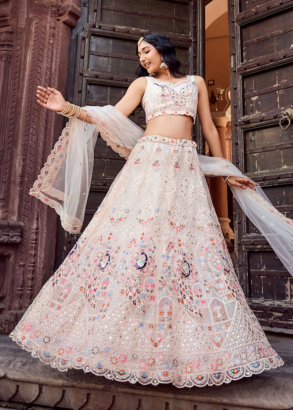 Buy Now Net Fabric Stone Work Cream Wedding Lehenga Choli Online in US, UK, Canada, France, Germany, Sweden, Greece, Denmark, UAE & Worldwide at Empress.