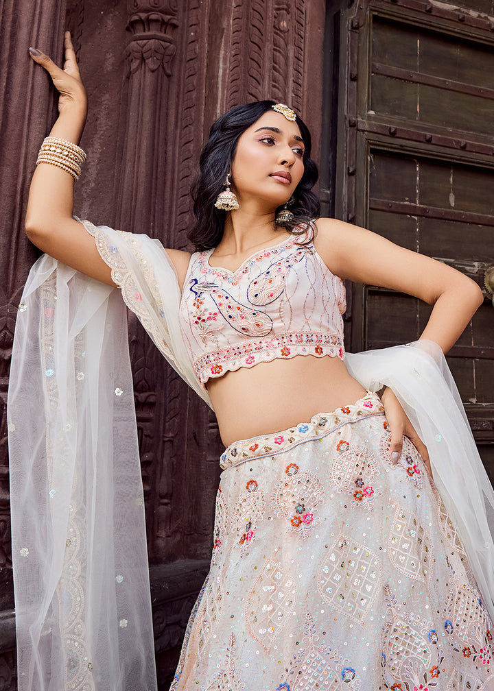 Buy Now Net Fabric Stone Work Cream Wedding Lehenga Choli Online in US, UK, Canada, France, Germany, Sweden, Greece, Denmark, UAE & Worldwide at Empress.