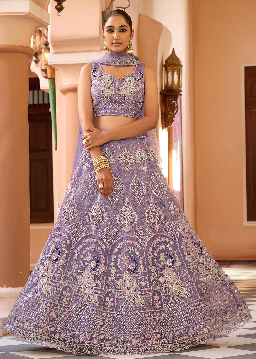 Buy Now Net Fabric Stone Work Mauve Wedding Lehenga Choli Online in US, UK, Canada, France, Germany, Sweden, Greece, Denmark, UAE & Worldwide at Empress.