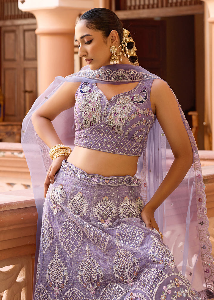 Buy Now Net Fabric Stone Work Mauve Wedding Lehenga Choli Online in US, UK, Canada, France, Germany, Sweden, Greece, Denmark, UAE & Worldwide at Empress.