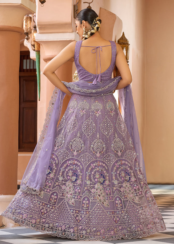 Buy Now Net Fabric Stone Work Mauve Wedding Lehenga Choli Online in US, UK, Canada, France, Germany, Sweden, Greece, Denmark, UAE & Worldwide at Empress.