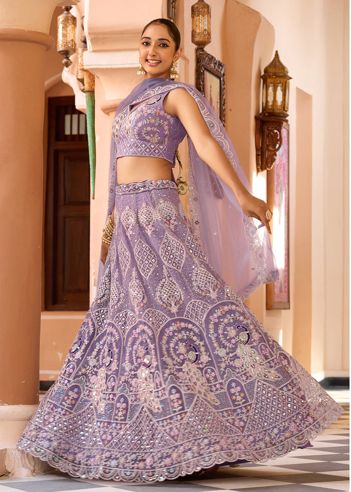 Buy Now Net Fabric Stone Work Mauve Wedding Lehenga Choli Online in US, UK, Canada, France, Germany, Sweden, Greece, Denmark, UAE & Worldwide at Empress.