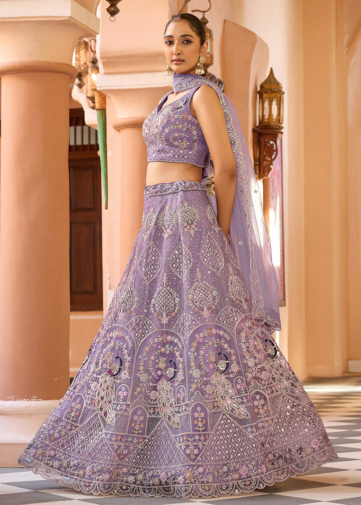 Buy Now Net Fabric Stone Work Mauve Wedding Lehenga Choli Online in US, UK, Canada, France, Germany, Sweden, Greece, Denmark, UAE & Worldwide at Empress.