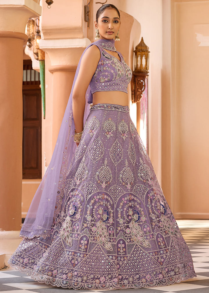 Buy Now Net Fabric Stone Work Mauve Wedding Lehenga Choli Online in US, UK, Canada, France, Germany, Sweden, Greece, Denmark, UAE & Worldwide at Empress.