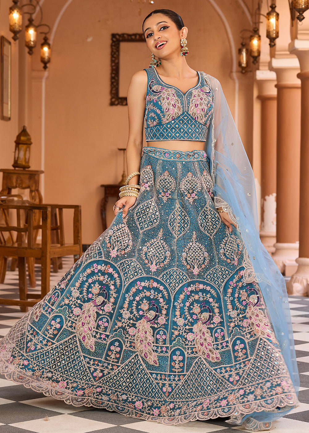 Buy Now Net Fabric Stone Work Teal Wedding Lehenga Choli Online in US, UK, Canada, France, Germany, Sweden, Greece, Denmark, UAE & Worldwide at Empress.