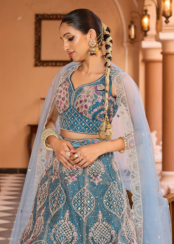 Buy Now Net Fabric Stone Work Teal Wedding Lehenga Choli Online in US, UK, Canada, France, Germany, Sweden, Greece, Denmark, UAE & Worldwide at Empress.