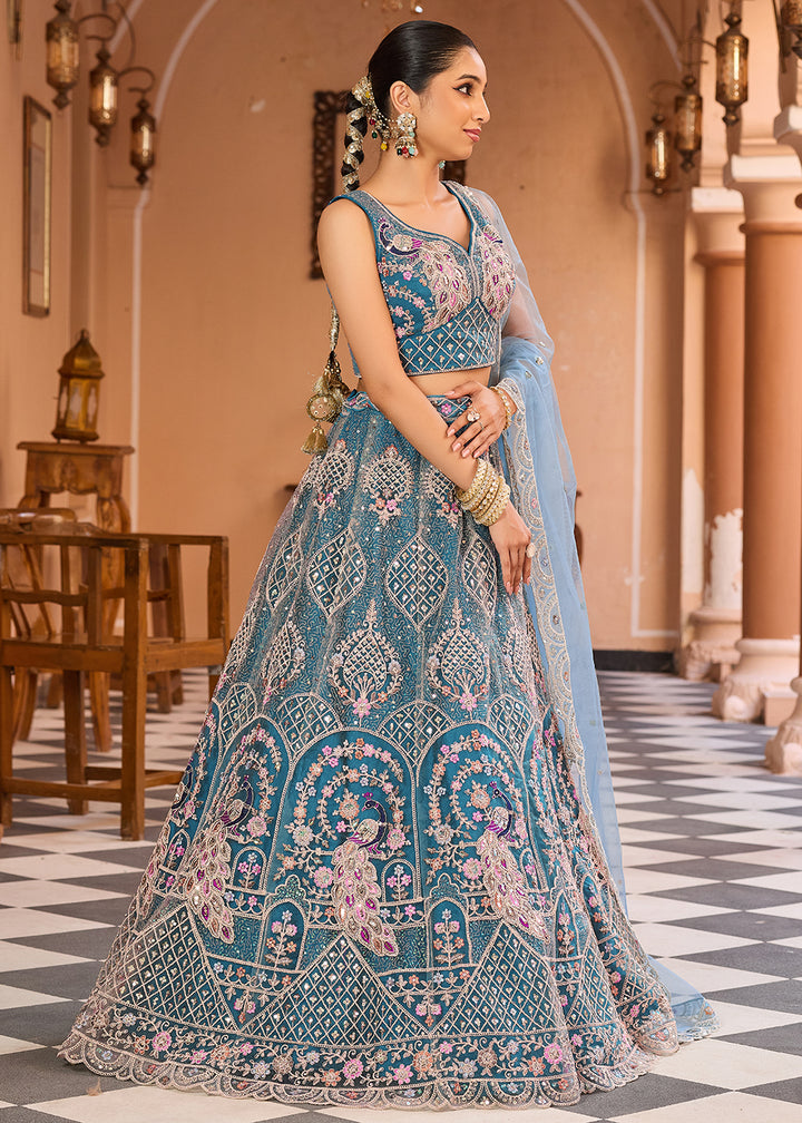 Buy Now Net Fabric Stone Work Teal Wedding Lehenga Choli Online in US, UK, Canada, France, Germany, Sweden, Greece, Denmark, UAE & Worldwide at Empress.