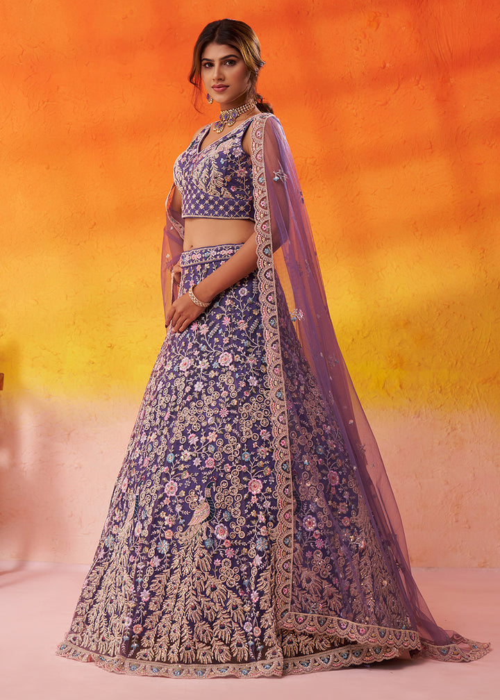 Buy Now Net Embroidered Purple Wedding Festive Lehenga Choli Online in US, UK, Canada, France, Germany, Sweden, Greece, Denmark, Spain & Worldwide at Empress.