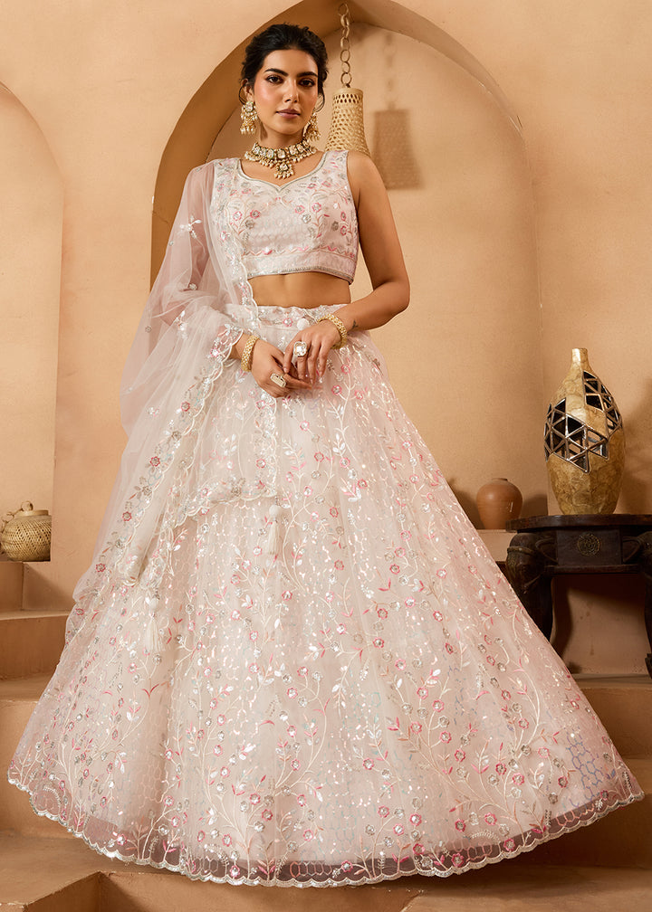 Buy Now Cream Sequins Embroidered Net Designer Party Lehenga Choli Online in US, UK, Canada, France, Italy, Germany, Sweden, Denmark & Worldwide at Empress.