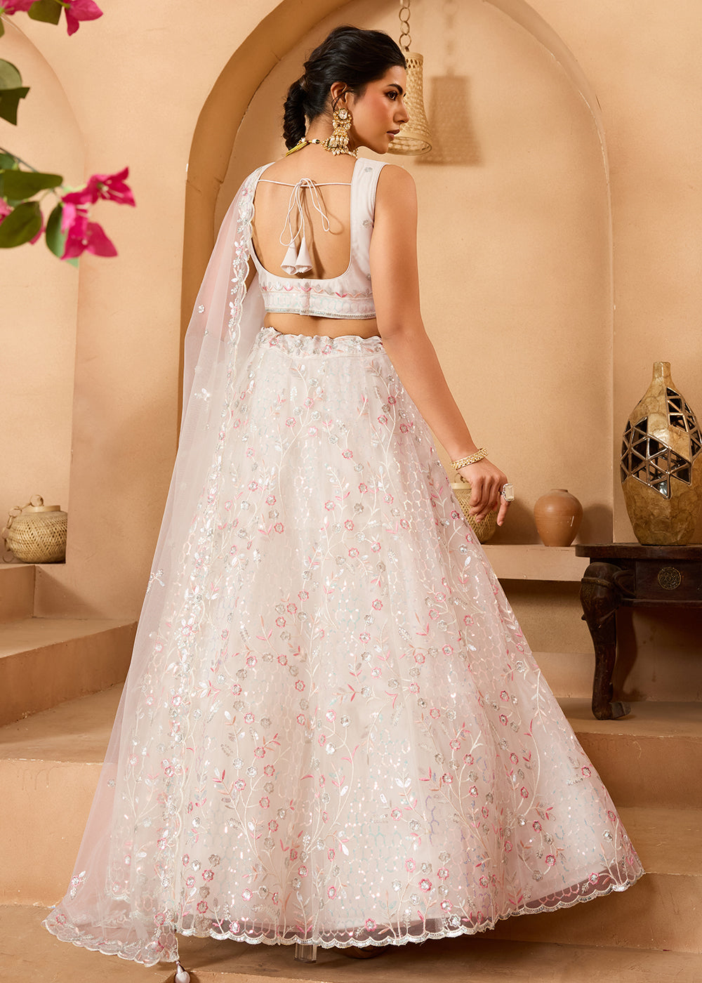 Buy Now Cream Sequins Embroidered Net Designer Party Lehenga Choli Online in US, UK, Canada, France, Italy, Germany, Sweden, Denmark & Worldwide at Empress.