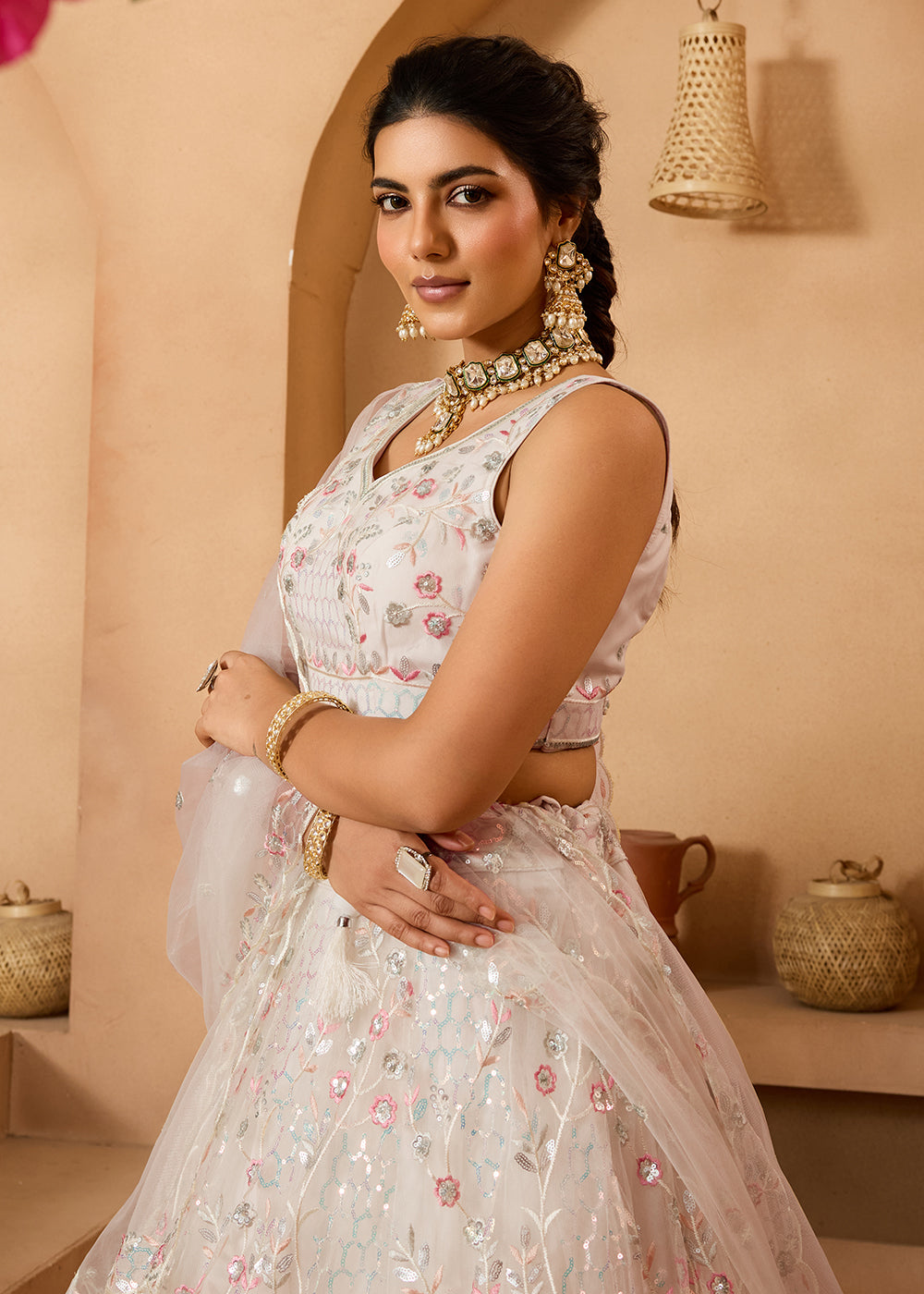 Buy Now Cream Sequins Embroidered Net Designer Party Lehenga Choli Online in US, UK, Canada, France, Italy, Germany, Sweden, Denmark & Worldwide at Empress.