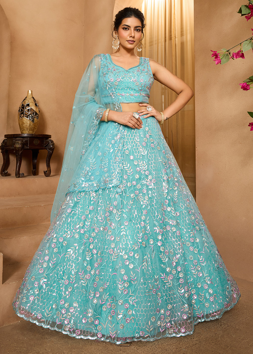 Buy Now Sea Green Sequins Embroidered Net Designer Party Lehenga Choli Online in US, UK, Canada, France, Italy, Germany, Sweden, Denmark & Worldwide at Empress.