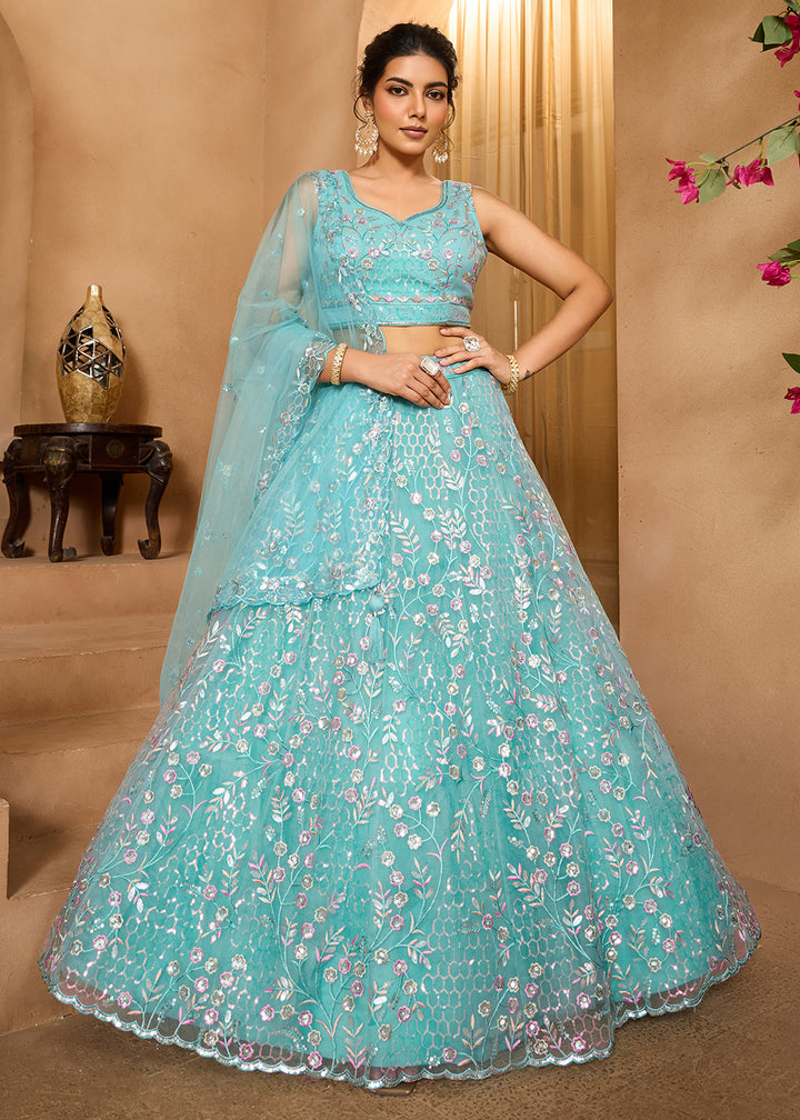 Buy Now Sea Green Sequins Embroidered Net Designer Party Lehenga Choli Online in US, UK, Canada, France, Italy, Germany, Sweden, Denmark & Worldwide at Empress.