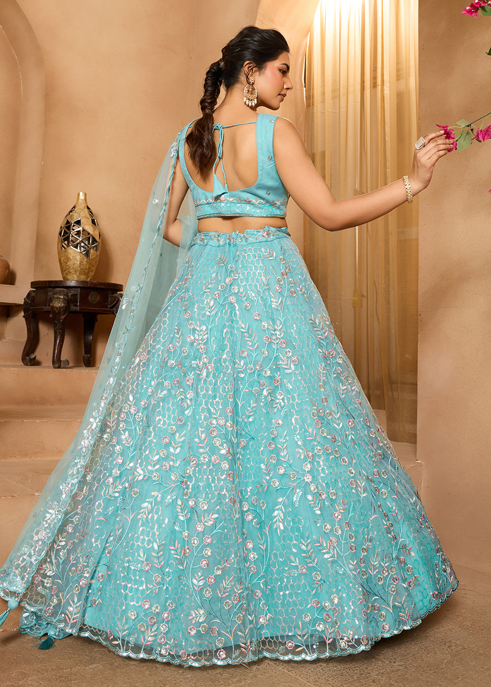 Buy Now Sea Green Sequins Embroidered Net Designer Party Lehenga Choli Online in US, UK, Canada, France, Italy, Germany, Sweden, Denmark & Worldwide at Empress.