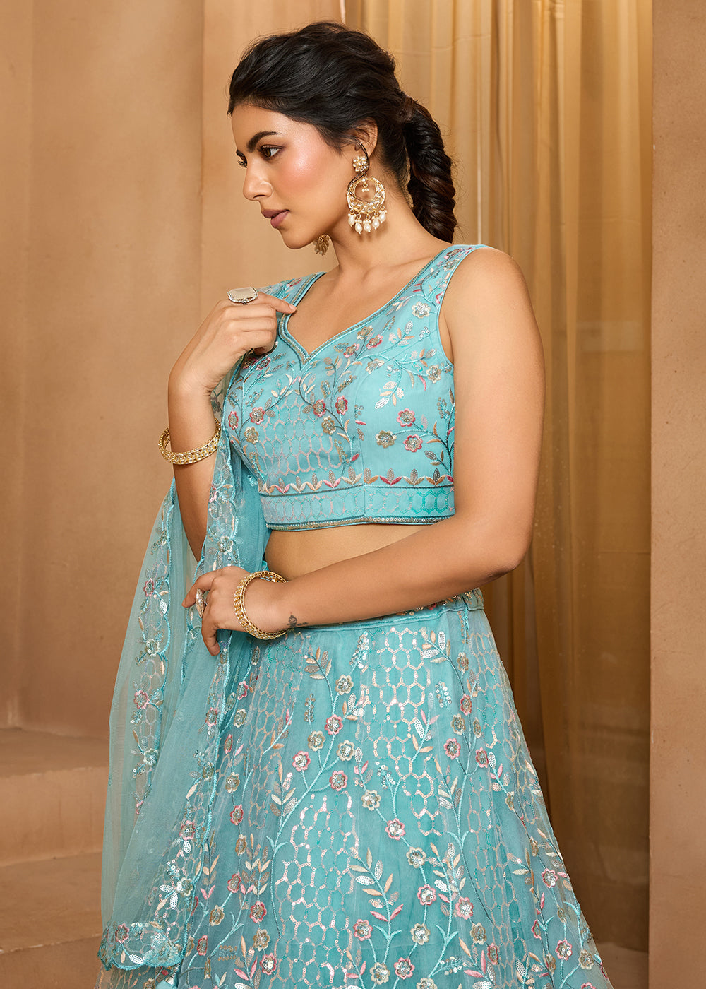 Buy Now Sea Green Sequins Embroidered Net Designer Party Lehenga Choli Online in US, UK, Canada, France, Italy, Germany, Sweden, Denmark & Worldwide at Empress.