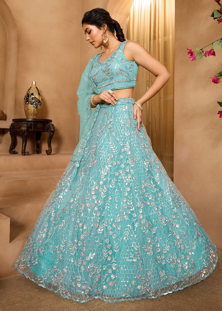 Buy Now Sea Green Sequins Embroidered Net Designer Party Lehenga Choli Online in US, UK, Canada, France, Italy, Germany, Sweden, Denmark & Worldwide at Empress.