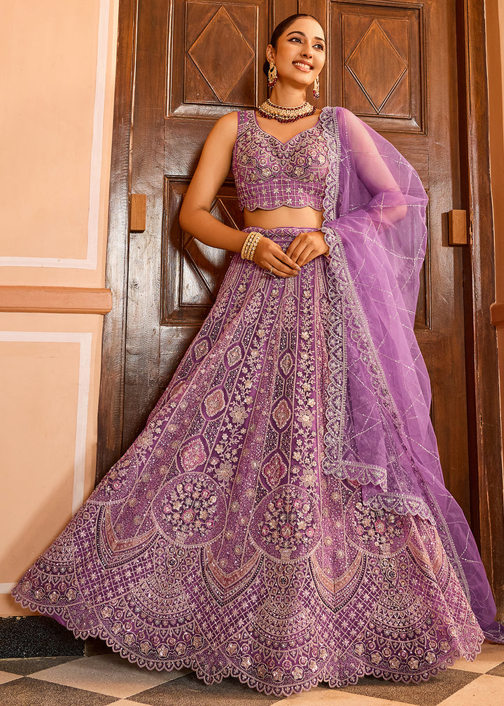 Buy Now Lavender Premium Quality Net Wedding Festive Lehenga Choli Online in US, UK, Canada, France, Germany, Sweden, Greece, Denmark,UAE & Worldwide at Empress