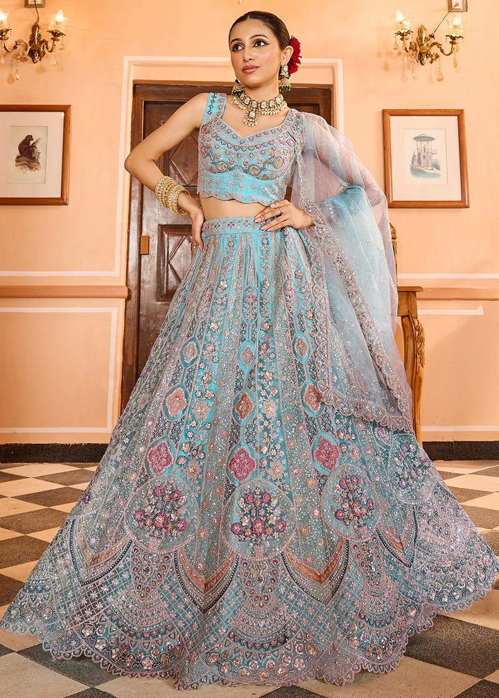 Buy Now Turquoise Premium Quality Net Wedding Festive Lehenga Choli Online in US, UK, Canada, France, Germany, Sweden, Greece, Denmark & Worldwide at Empress.