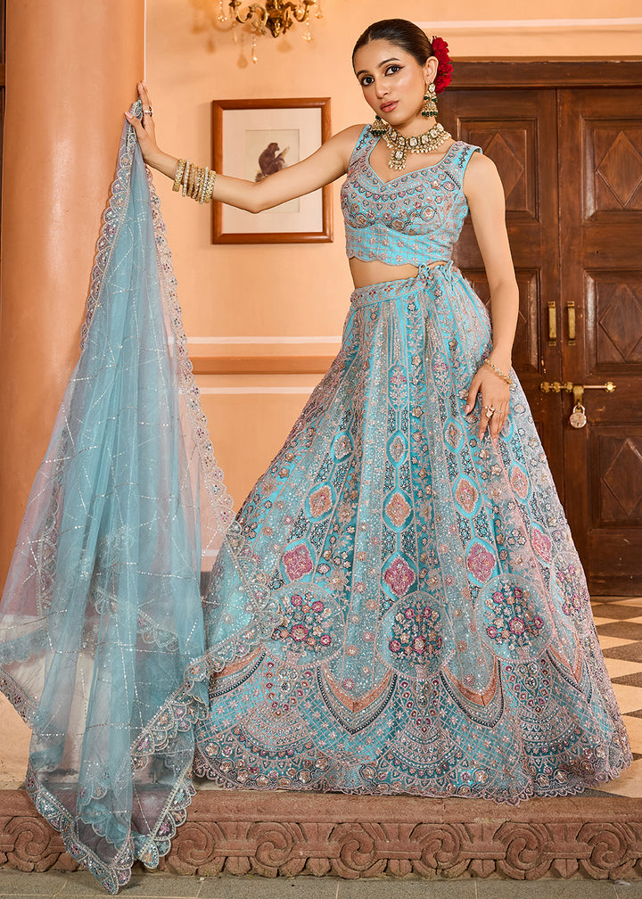 Buy Now Turquoise Premium Quality Net Wedding Festive Lehenga Choli Online in US, UK, Canada, France, Germany, Sweden, Greece, Denmark & Worldwide at Empress.